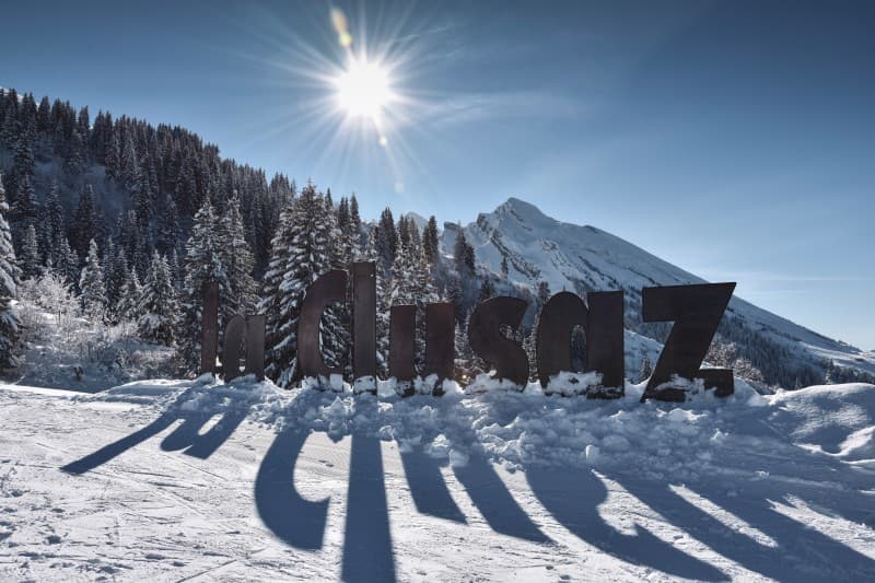 La Clusaz sign in the snow